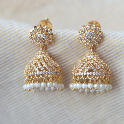 Heritage gold plated white stone jumka earrings  HJ4788