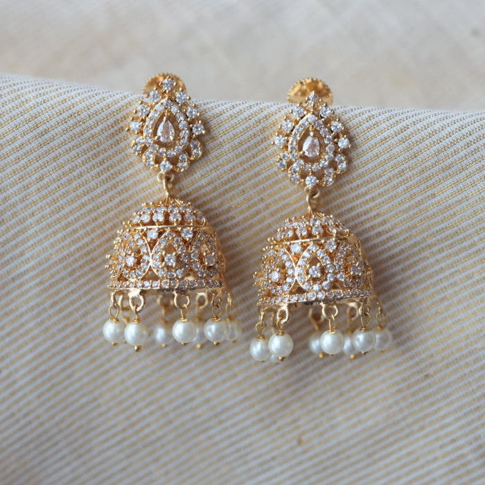 Heritage gold plated white stone jumka earrings  HJ1445