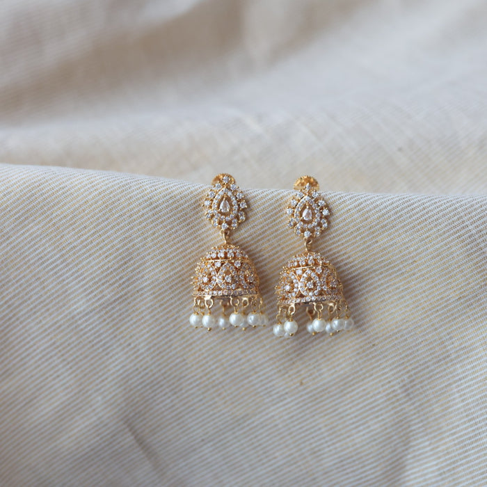 Heritage gold plated white stone jumka earrings  HJ1445