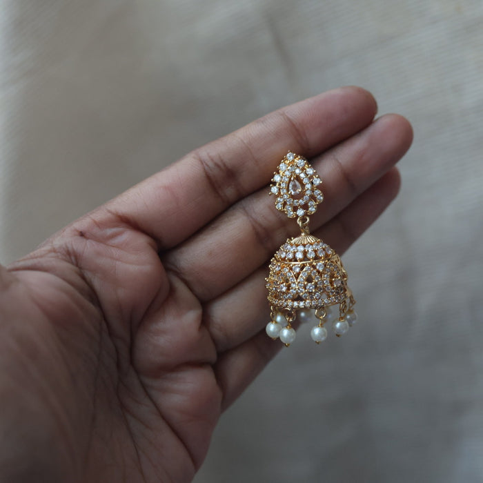 Heritage gold plated white stone jumka earrings  HJ1445