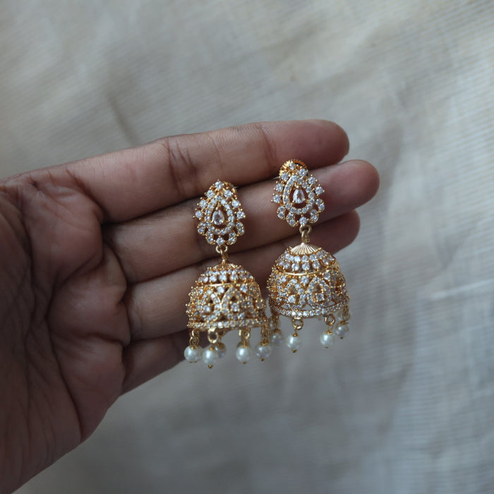 Heritage gold plated white stone jumka earrings  HJ1445