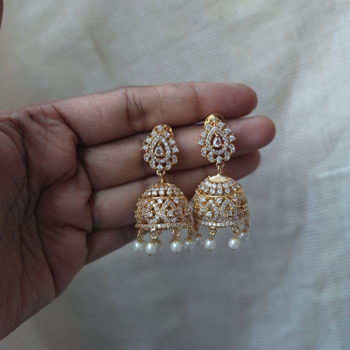 Heritage gold plated white stone jumka earrings  HJ1445