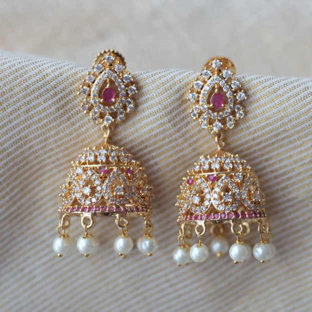 Heritage gold plated ruby white stone jumka earrings  HJ67898
