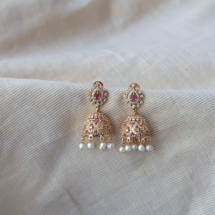 Heritage gold plated ruby white stone jumka earrings  HJ67898