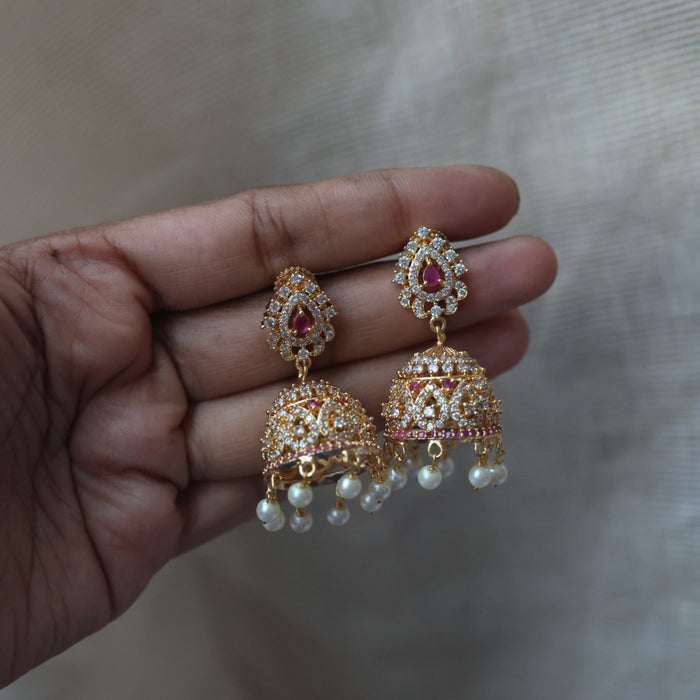 Heritage gold plated ruby white stone jumka earrings  HJ67898