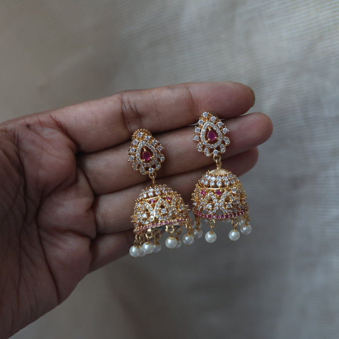 Heritage gold plated ruby white stone jumka earrings  HJ67898