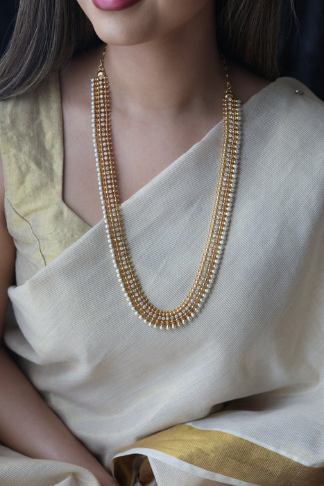 Heritage gold plated pearl and white stone long necklace HL6833