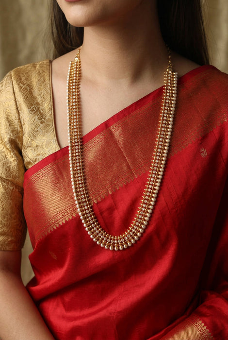 Heritage gold plated pearl and white stone long necklace HL6833