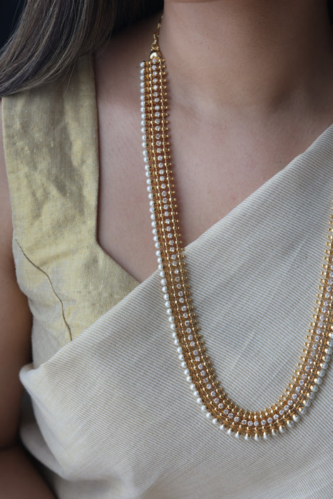Heritage gold plated pearl and white stone long necklace HL6833