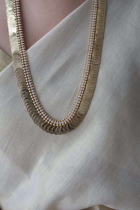 Heritage gold plated white stone coin design long necklace HL1673