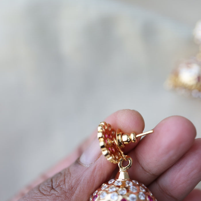 Heritage gold plated ruby white stone jumka earrings HJ17811