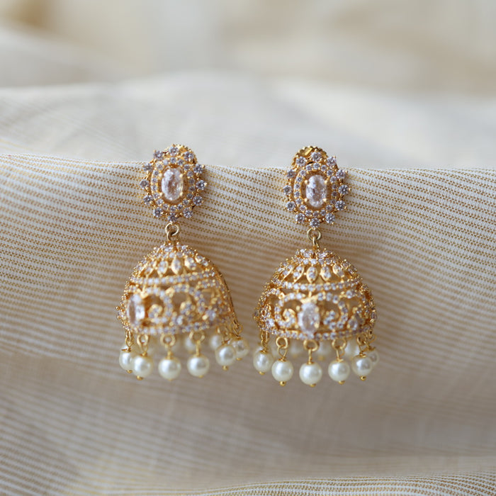 Heritage gold plated white stone jumka earrings  HJ42