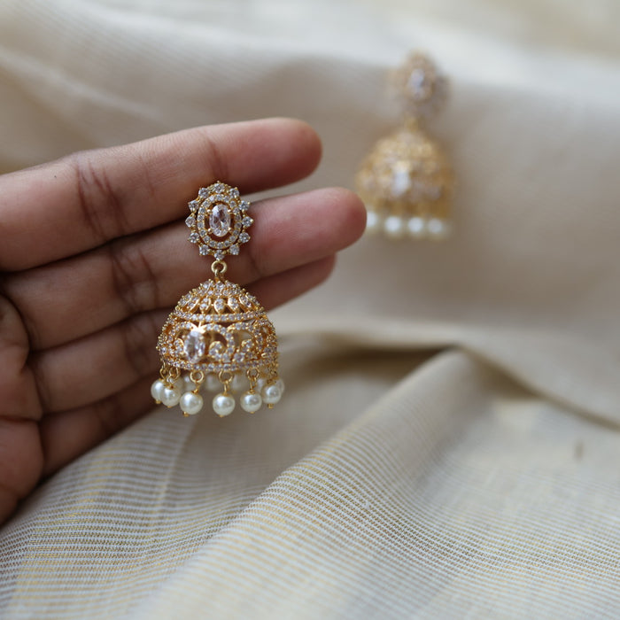 Heritage gold plated white stone jumka earrings  HJ42