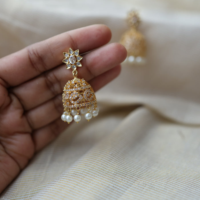 Heritage gold plated white stone jumka earrings  HJ780