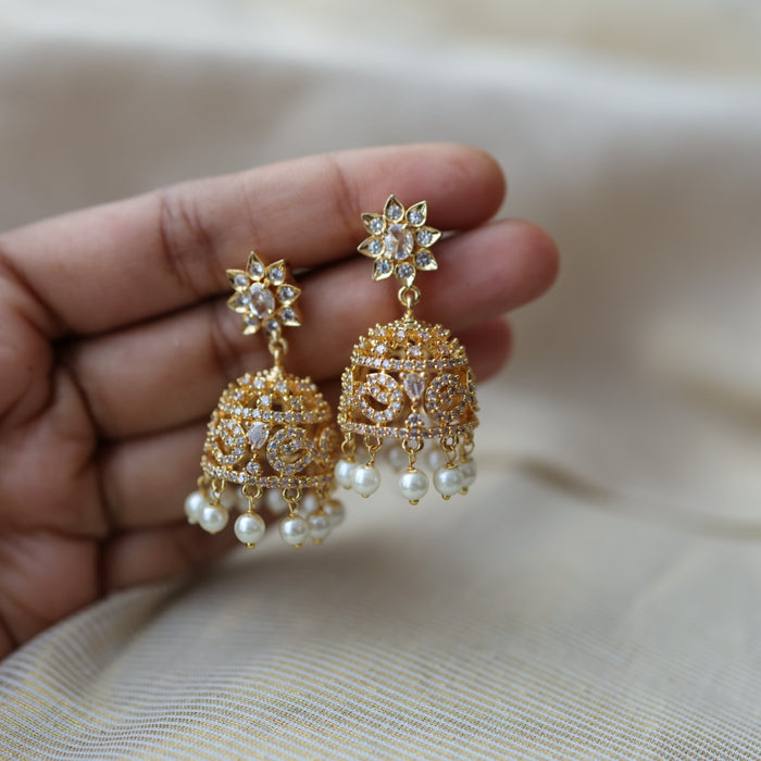 Heritage gold plated white stone jumka earrings  HJ780