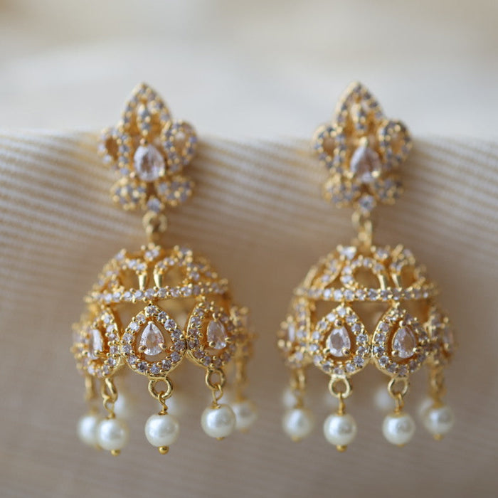 Heritage gold plated white stone jumka earrings  HJ432