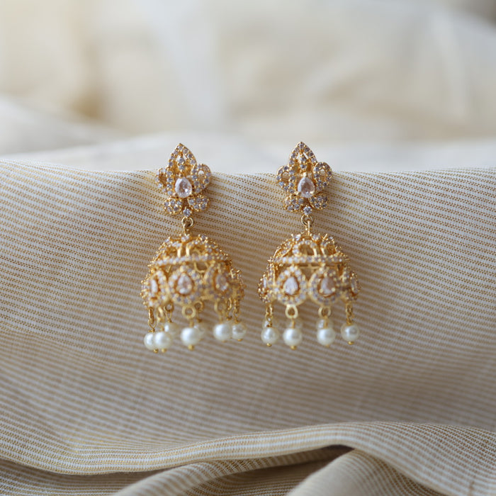 Heritage gold plated white stone jumka earrings  HJ432