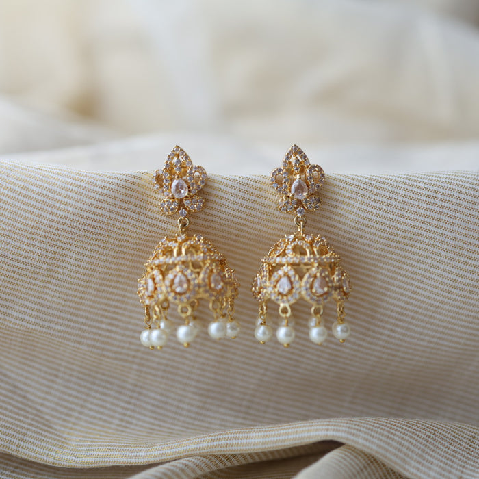 Heritage gold plated white stone jumka earrings  HJ432