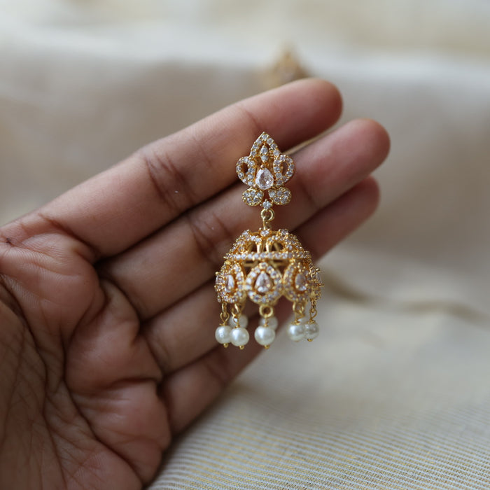 Heritage gold plated white stone jumka earrings  HJ432