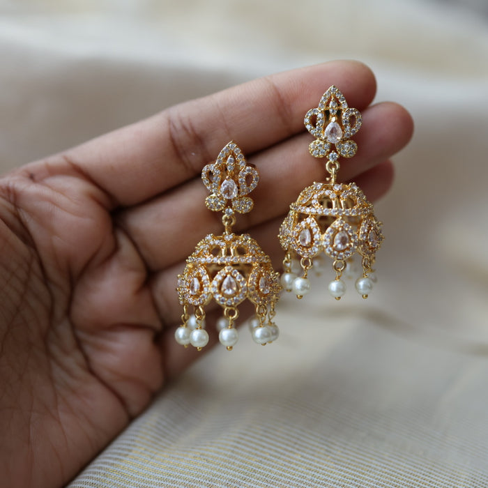Heritage gold plated white stone jumka earrings  HJ432