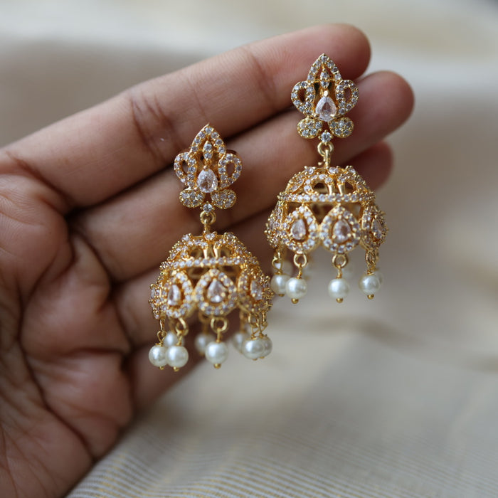 Heritage gold plated white stone jumka earrings  HJ432