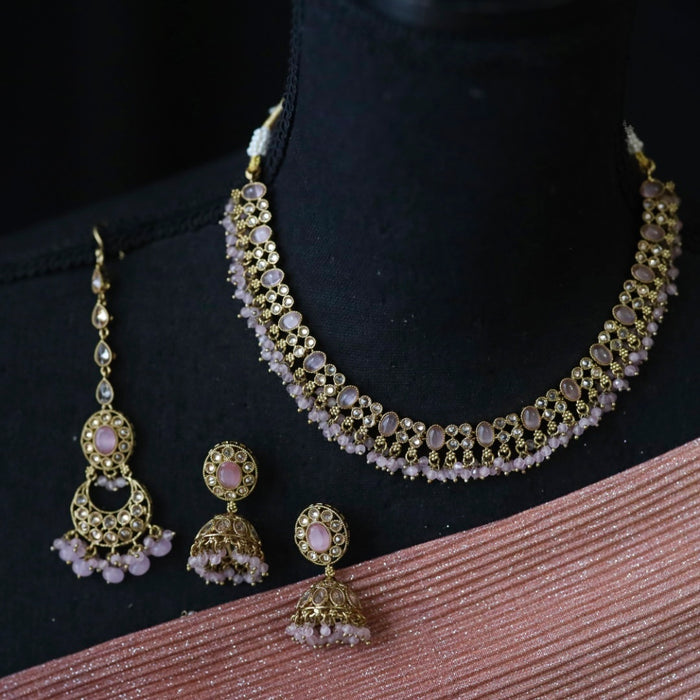 Trendy pink short necklace with earrings and tikka 148891