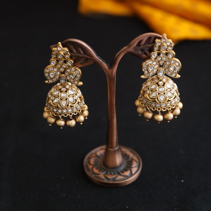 Antique white stone jumka earrings 124490