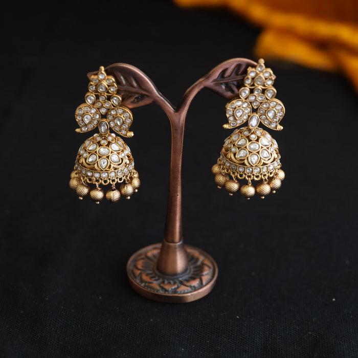 Antique white stone jumka earrings 124490