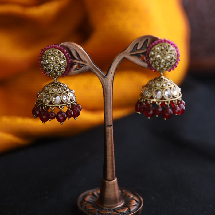 Trendy ruby pearl jumka earrings 124673