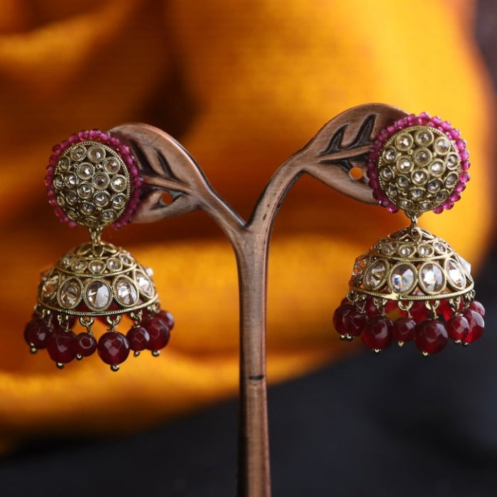 Trendy ruby pearl jumka earrings 124673