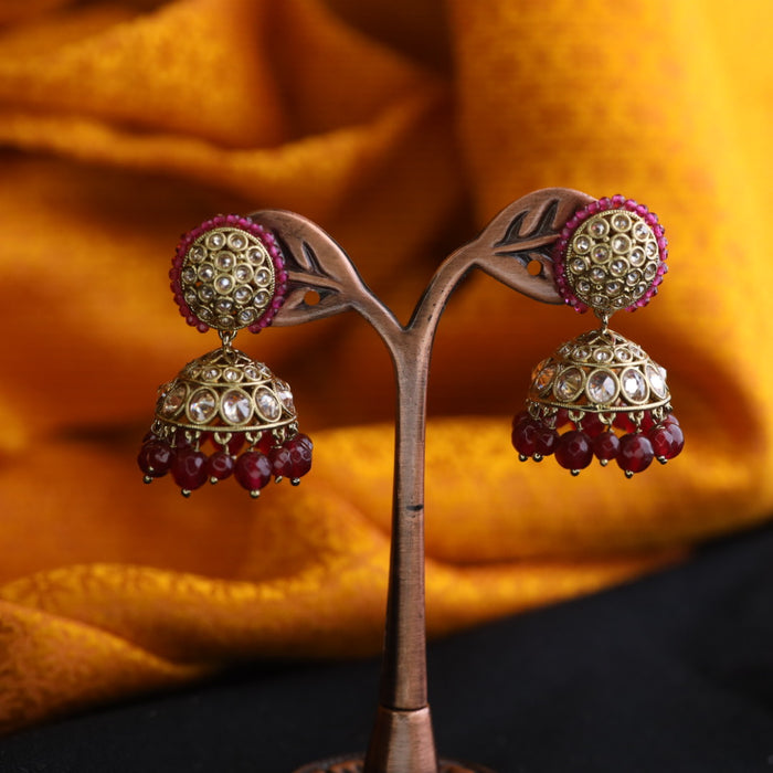 Trendy ruby pearl jumka earrings 124673