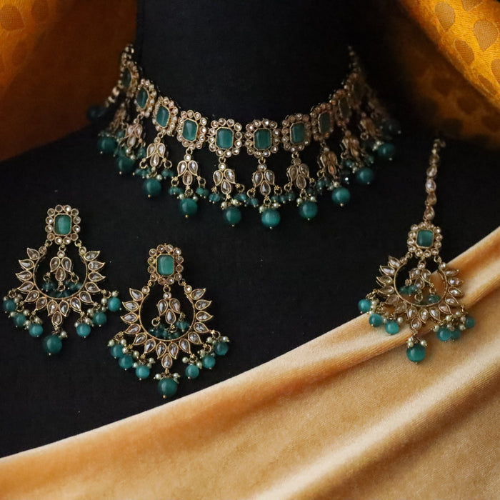 Trendy green bead choker necklace with earrings and tikka 134512