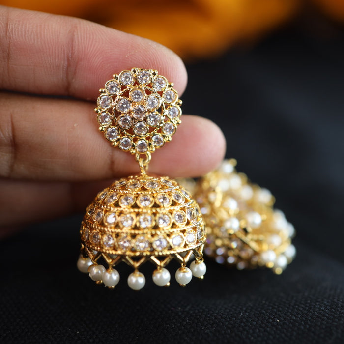 Heritage gold plated white stone jumka earrings 1246751