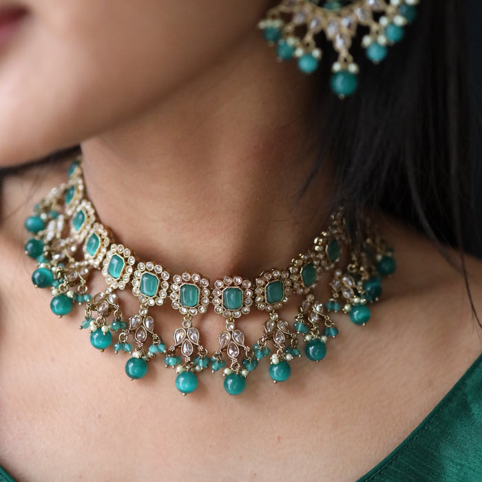 Trendy green bead choker necklace with earrings and tikka 134512