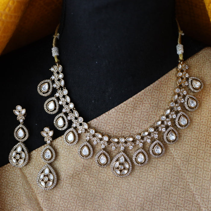 Trendy white short necklace with earrings and tikka 14854111