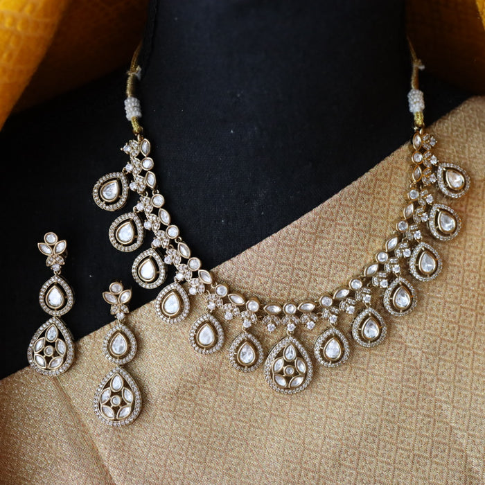 Trendy white short necklace with earrings and tikka 14854111