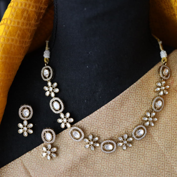 Trendy white stone short necklace with earrings and tikka 14851111