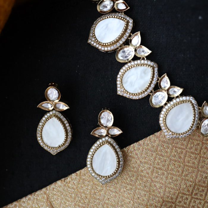 Trendy mother of pearl stone short necklace with earrings and tikka 1485424