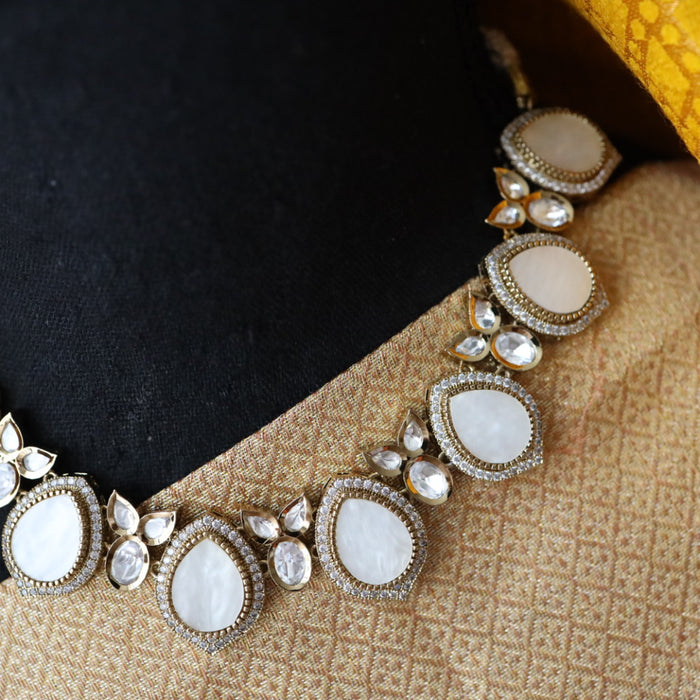 Trendy mother of pearl stone short necklace with earrings and tikka 1485424