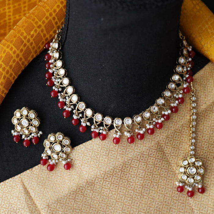 Trendy red pearl short necklace with earrings and tikka 148225