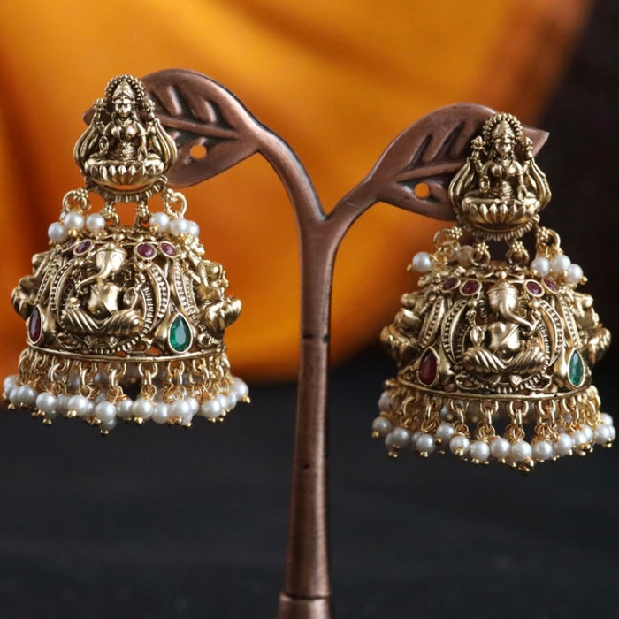 Antique gold temple jumka earrings 466669