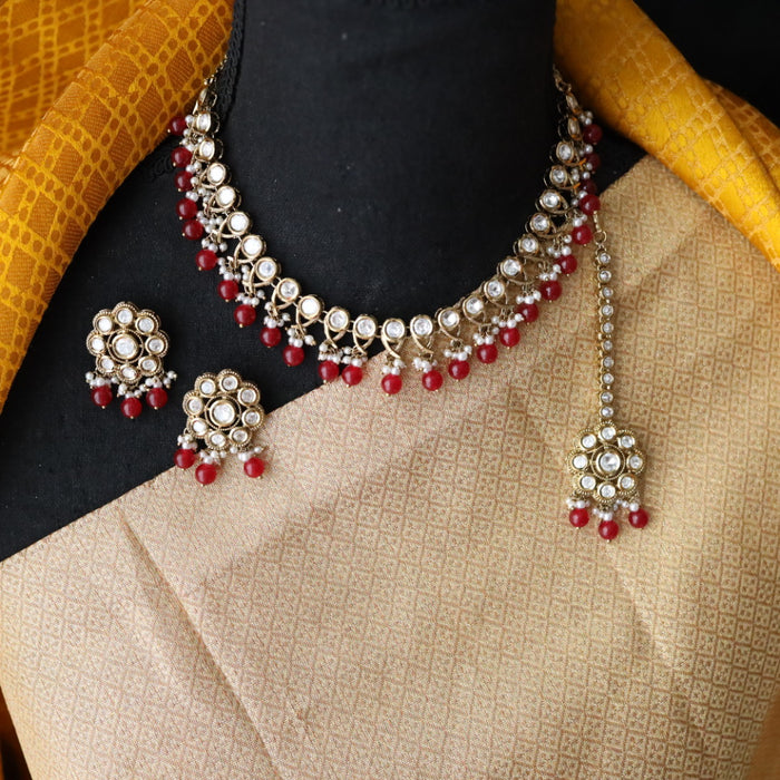 Trendy red pearl short necklace with earrings and tikka 148225