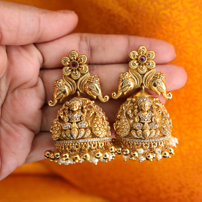Antique gold temple jumka earrings 1246763