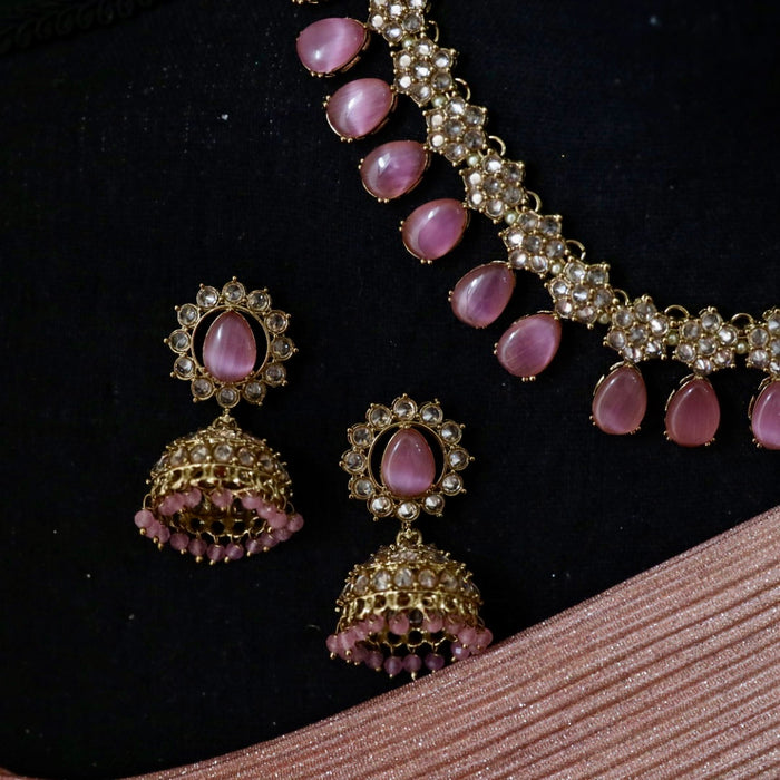 Trendy pink bead choker necklace with earrings and tikka 644333