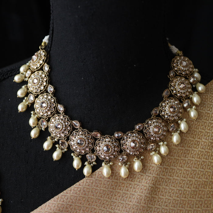 Trendy white bead choker necklace with earrings and tikka 4855443