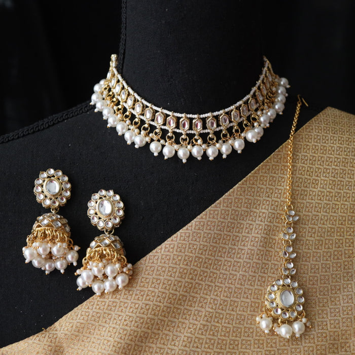 Trendy white bead choker necklace with earrings and tikka 543331