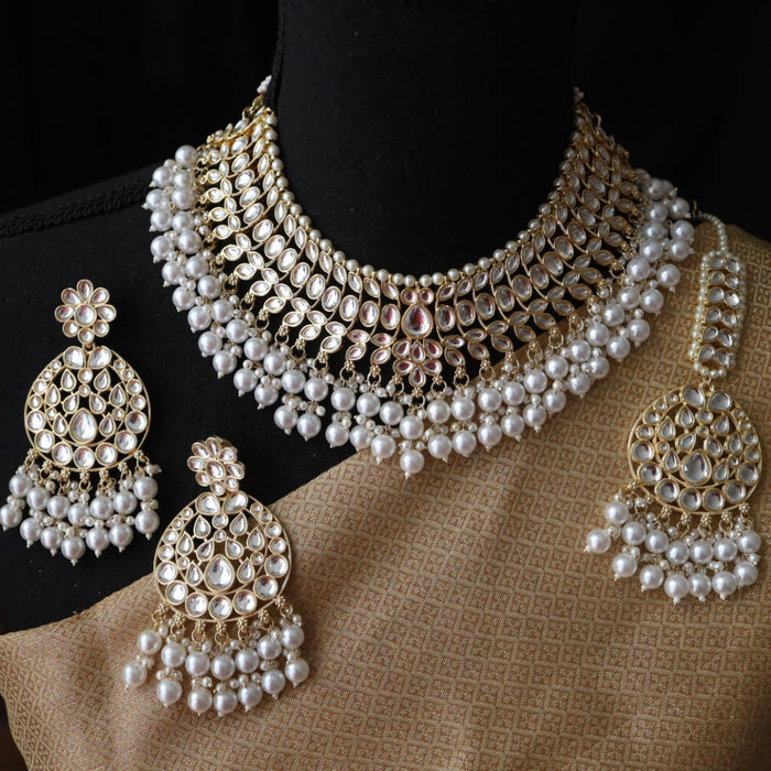 Trendy white bead short necklace with earrings and tikka 485566