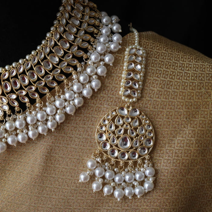 Trendy white bead short necklace with earrings and tikka 485566