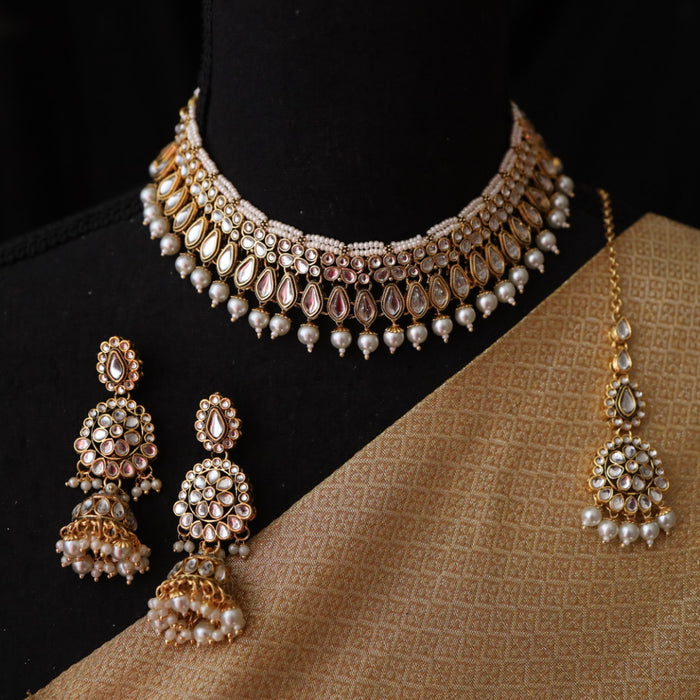Trendy white bead choker necklace with earrings and tikka 485566