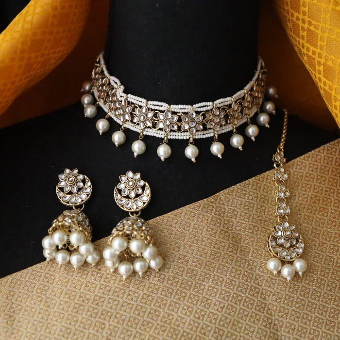 Heera white Kundan stone and pearls necklace with earrings and tikka 17655